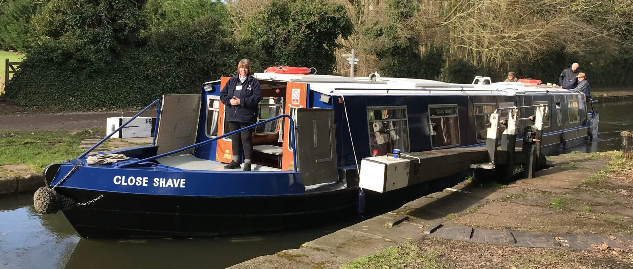 IMG_3613 – Copy Narrow boat called 'Close Shave' entering a lock on the Grand Union Canal.